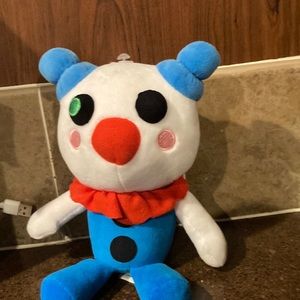 Clown monster is in good condition but does have a stain on the back of the head